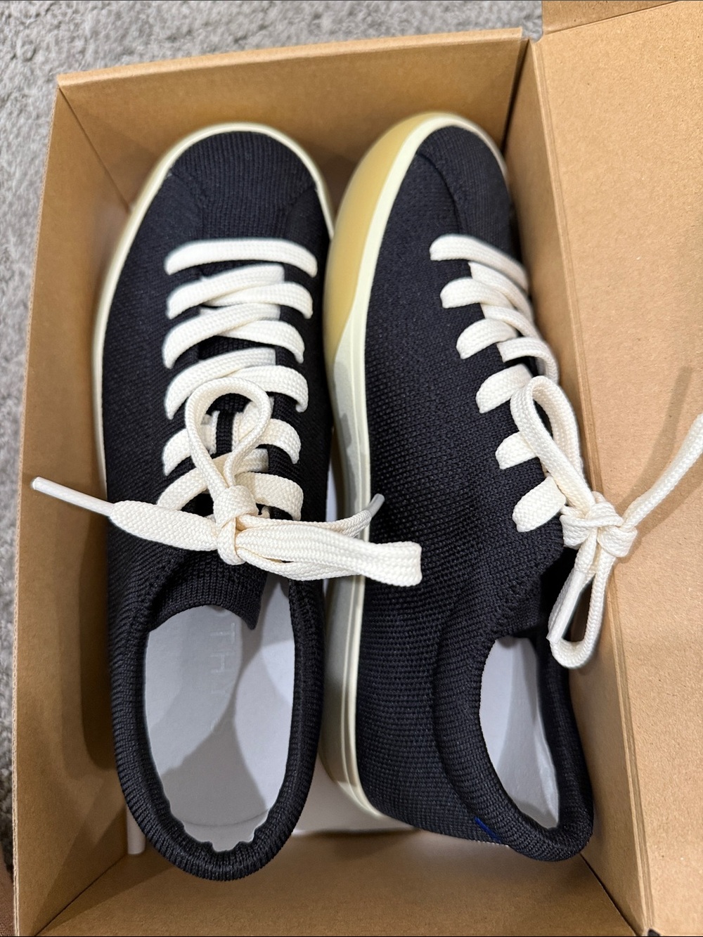 Rothy’s new Black Knit Lace-Up Sneakers with Cream Soles